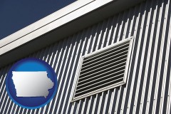 iowa map icon and metal-clad building architectural details