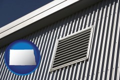 north-dakota map icon and metal-clad building architectural details
